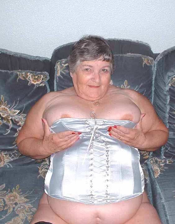 Busty granny in a tight basque