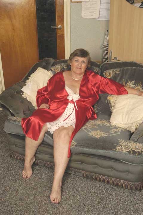 Grandma in red lingerie showing pink