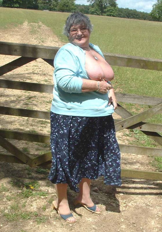 Granny in knickers on a country field